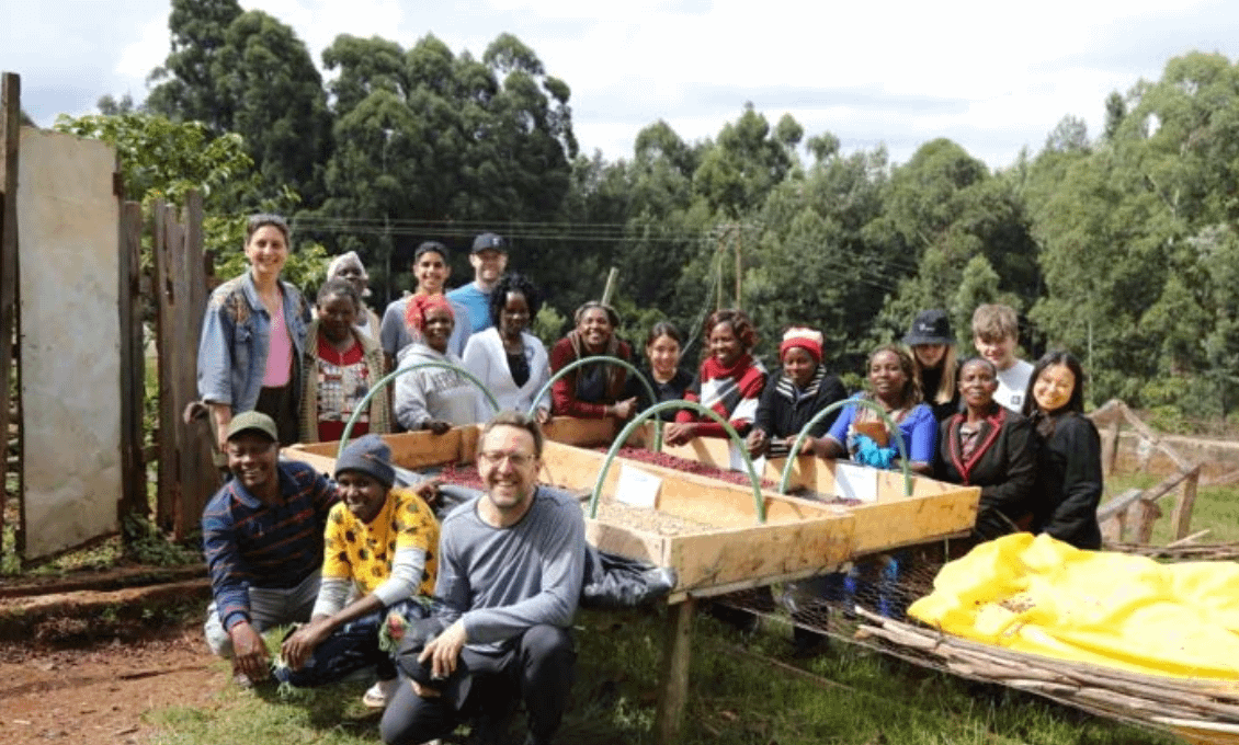 A group of people posing for a photo
AI-generated content may be incorrect.