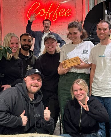 A group of people posing for a photo
AI-generated content may be incorrect.