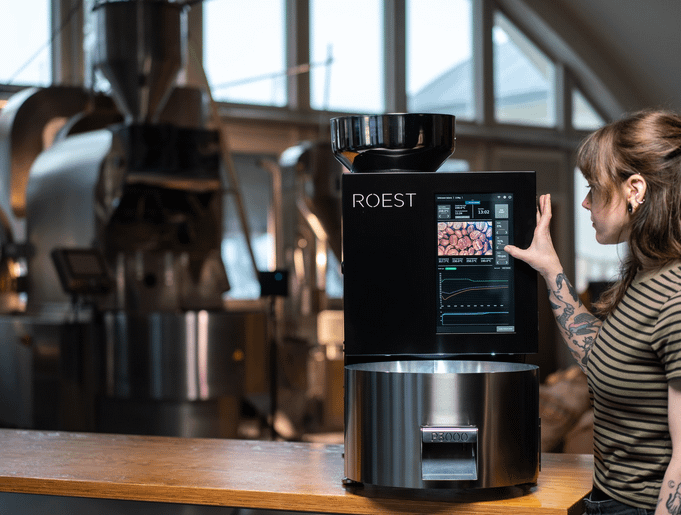 A person looking at a machine
AI-generated content may be incorrect.