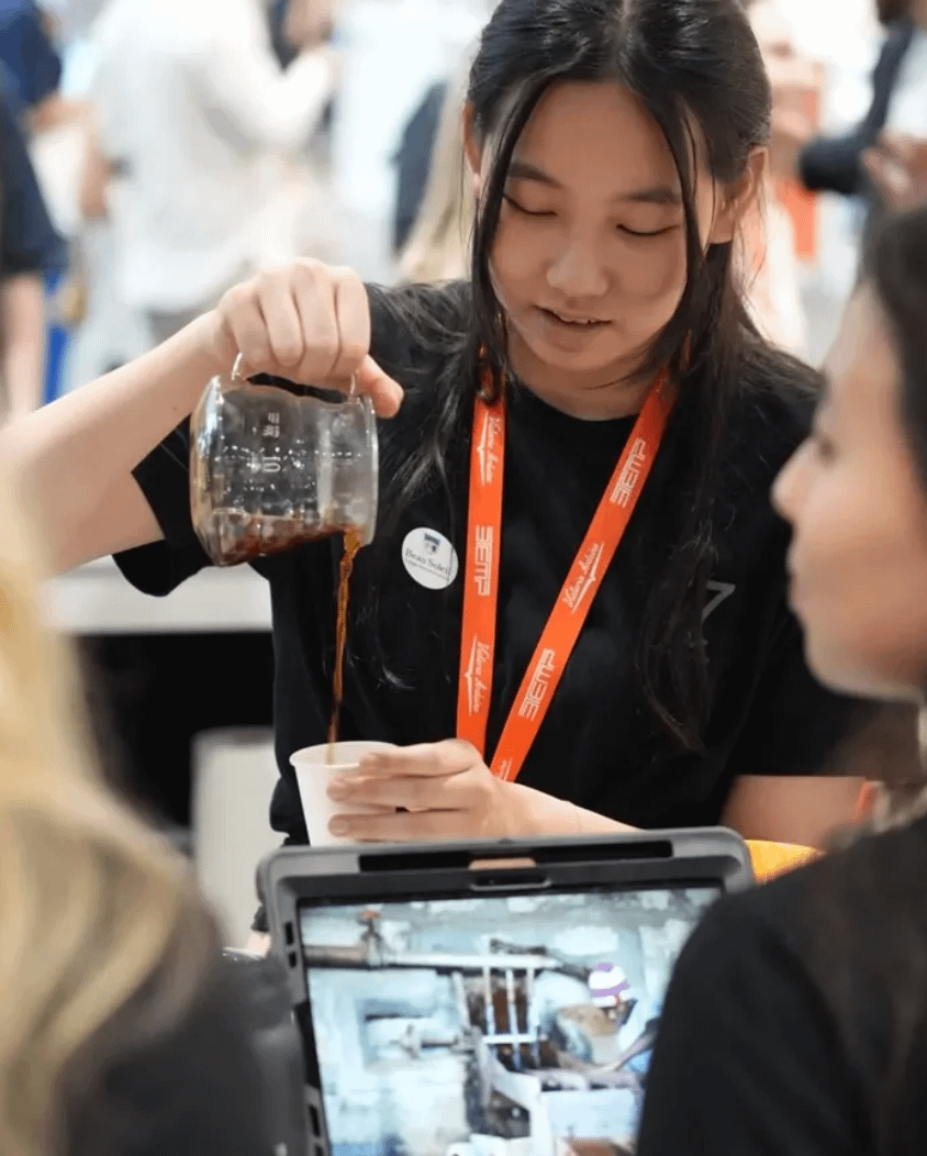 A person pouring coffee into a cup
AI-generated content may be incorrect.